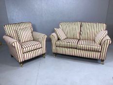 Contemporary striped upholstered two seater sofa and matching armchair by Potburys of Sidmouth, with