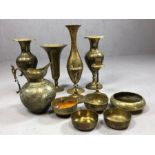 Good collection of Eastern brassware to include vases, candlesticks, jugs and dishes, 12 pieces