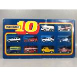 'Matchbox 10' presentation box of ten diecast vehicles to include NASA rocket launcher, London