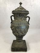 Composite reproduction black urn on plinth with lid, approx 70cm tall (repair to lid)