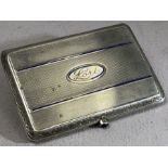 Silver continental cigarette case marked 935 approx 5.5 x 8cm and 64g
