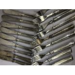 Christofle Silver coloured fish knives and forks 9 of each
