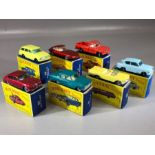Seven boxed Matchbox Series diecast model vehicles: 7 Ford Anglia, 33 Ford Zephyr III, 32 E Type