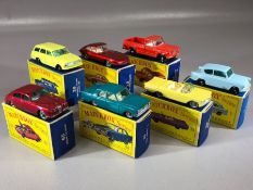 Seven boxed Matchbox Series diecast model vehicles: 7 Ford Anglia, 33 Ford Zephyr III, 32 E Type