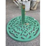 Cast iron parasol stand, painted green