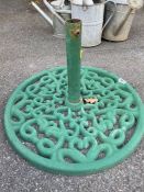Cast iron parasol stand, painted green