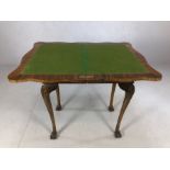 Metamorphic games table on ball and claw feet with baize top. When fully extended approx 90cm x 68cm