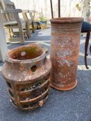 Two vintage weathered chimney pots, the largest approx 55cm tall (AF)