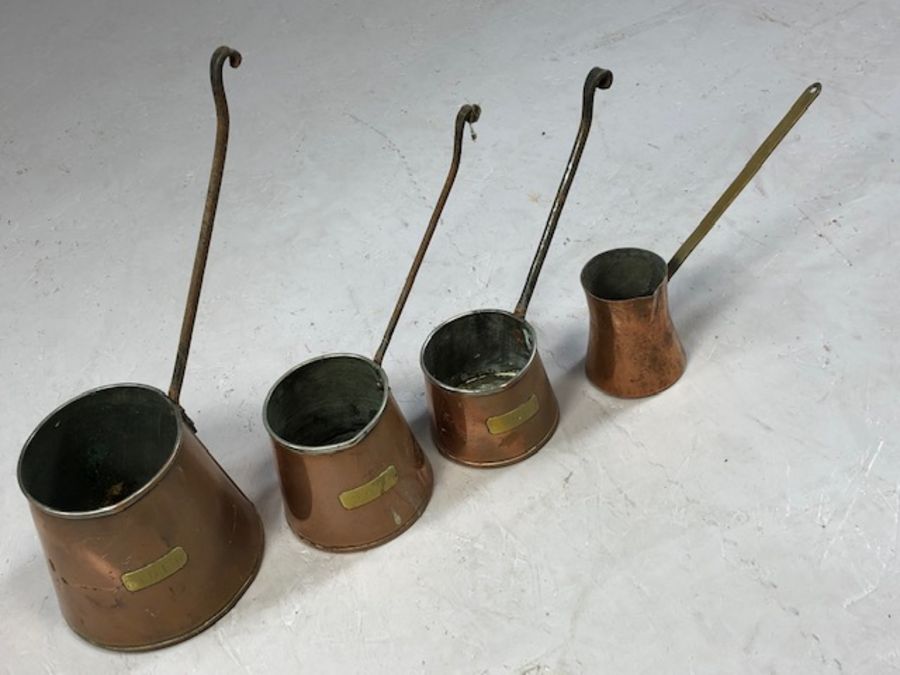Collection of four antique copper spirit measures - Image 3 of 3