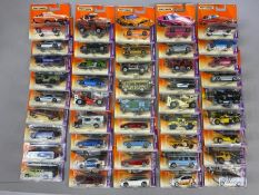 Forty five Matchbox model diecast vehicles, all in sealed orange blister packs