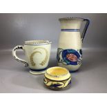 Collection of three pieces of Honiton Ware to include a jug approx 25cm in height, a smaller jug