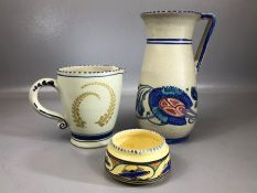 Collection of three pieces of Honiton Ware to include a jug approx 25cm in height, a smaller jug