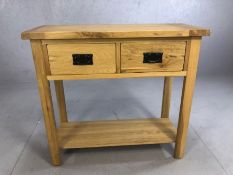 Modern light wood console table with two drawers and shelf under, approx 85cm x 35cm x 78cm tall