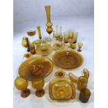 Selection of mid century amber glass ware to include vases, goblets, bowls and candle holders