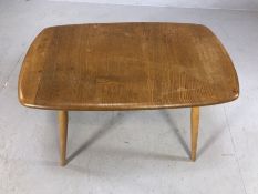 Light wood Ercol occasional side table. Approx - 72cm x 44cm x 45