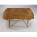 Light wood Ercol occasional side table. Approx - 72cm x 44cm x 45