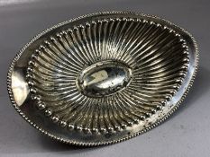 Continental Silver fluted bowl of oval form marked STERLING and approx 21cm across and 145g