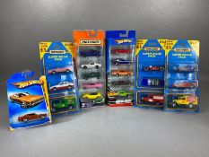 Collection of diecast vehicles to include three packs of three Matchbox cars, a Matchbox pack of