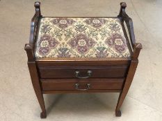 Upholstered piano stool with two fall front drawers
