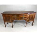 Inlaid Edwardian serpentine-fronted sideboard with two cupboards and four drawers, with original