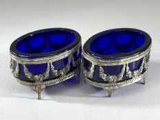 Pair of continental salts with blue glass liners