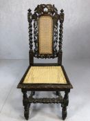 Antique heavily carved gothic hall chair