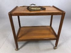 Mid century tea trolley on castors with a dining table dust pan and brush