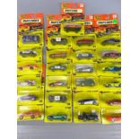 Twenty five Matchbox Superfast model diecast vehicles, all in sealed orange and yellow blister