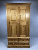 Pine two door wardrobe with hanging rail and three drawers to base, approx 104cm x 58c, x 192cm