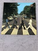 Beatles 'Abbey Road' LP with misaligned apple to rear cover