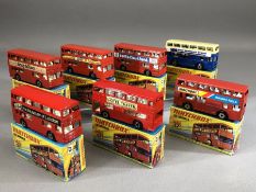 Seven boxed Matchbox no 17 'The Londoner' diecast model buses: West Midlands Travel, Santa Claus