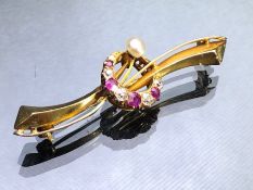 Gold (unmarked but possibly 15ct or 18ct) central Crescent with 4 Rubies and 5 Old cut Diamonds, and