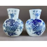 Pair of opaline glass vases, white ground with blue floral decoration, marked '5' to base, each