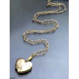 9ct Gold chain and unmarked Gold coloured heart shaped locket