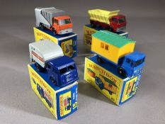 Four boxed Matchbox Series diecast model vehicles: 7 Refuse Truck, 15 Dennis Refuse Truck, 60