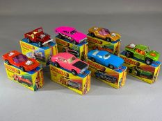 Seven boxed Matchbox Superfast diecast model vehicles: 2 Jeep Hot Rod, 4 Gruesome Twosome x 2, 13