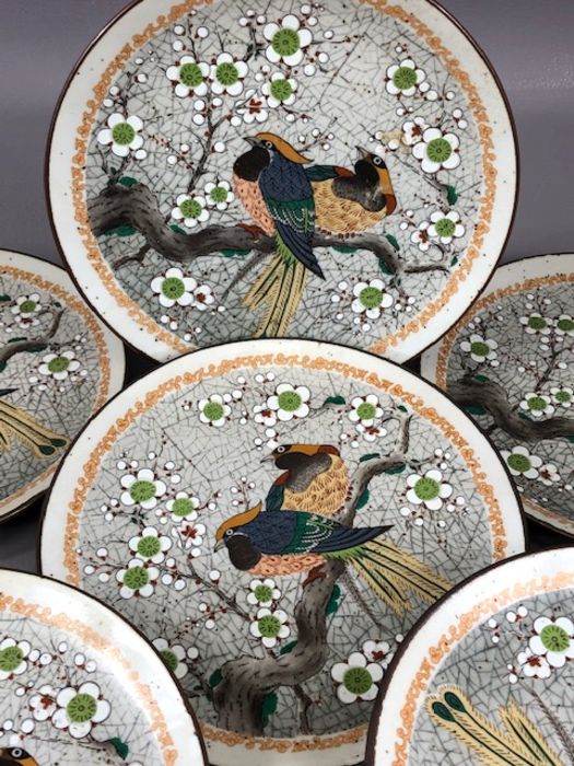 Collection of six Oriental stoneware plates decorated with birds on a branch, surrounded by flowers, - Image 2 of 4