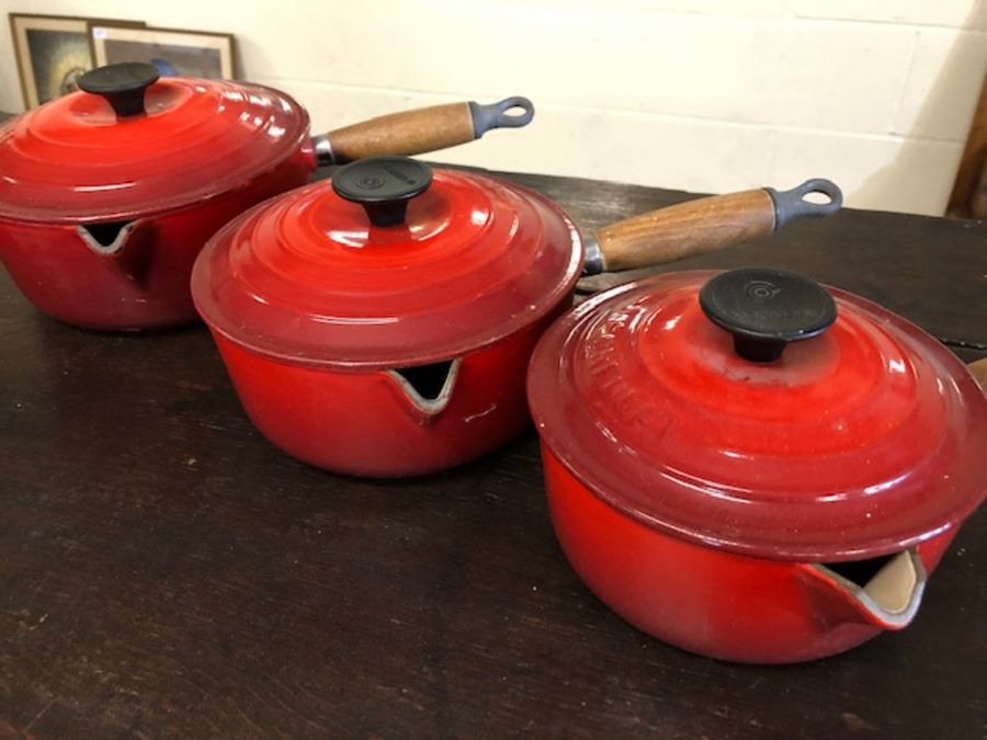 Collection of three Le Creuset cast iron lidded saucepans in red - Image 2 of 3