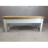 Modern pine-effect storage bench with white-painted legs