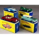 Four boxed Matchbox Series diecast model vehicles: 31 Ford Station Wagon, 41 Jaguar Racing Car, 53