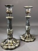 Pair of Silver coloured candlesticks approx 23cm tall A/F