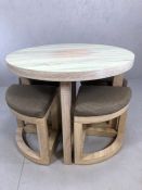 Modern circular table and integrated stools