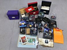HARRY POTTER: Collection of merchandise to include collectable trading cards, tins containing foil