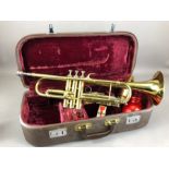 Cased Melody Maker trumpet with Bach mouthpiece and accessories