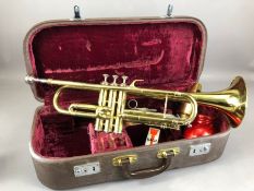 Cased Melody Maker trumpet with Bach mouthpiece and accessories