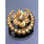 Gold (unmarked but possibly 15ct or 18ct) Small Crescent Brooch set with graduated seed pearls and