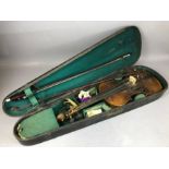 Vintage cased violin marked Stainer, with two bows, one with mother of pearl inlay (A/F)