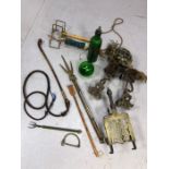 Collection of vintage items to include whip, roller skates, metal and glass ware