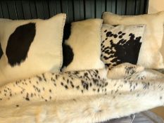 Modern Interiors: Collection of four cow hide cushions and one throw