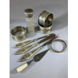 Collection of hallmarked silver items to include napkin rings, silver lidded scent bottle, baptismal